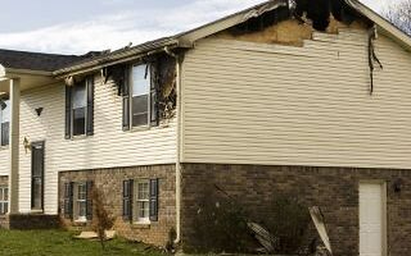 Illustrative example: the same house with fire damage before restoration